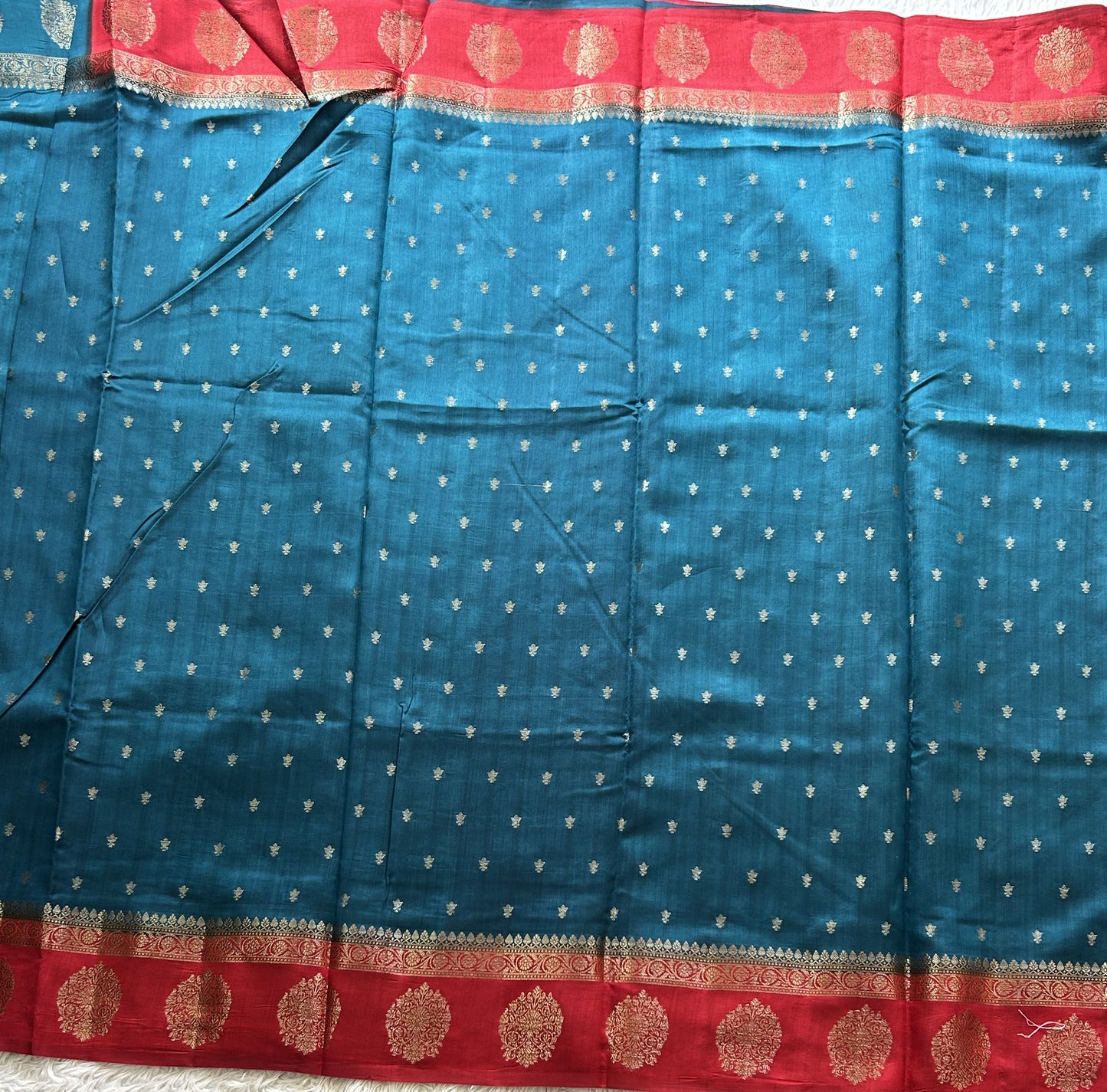 Pure Chiniya Silk Saree Dark Teel Blue Colored Elegantly Paired with a Gold Zari Border. - Sampradaya Designer Studio