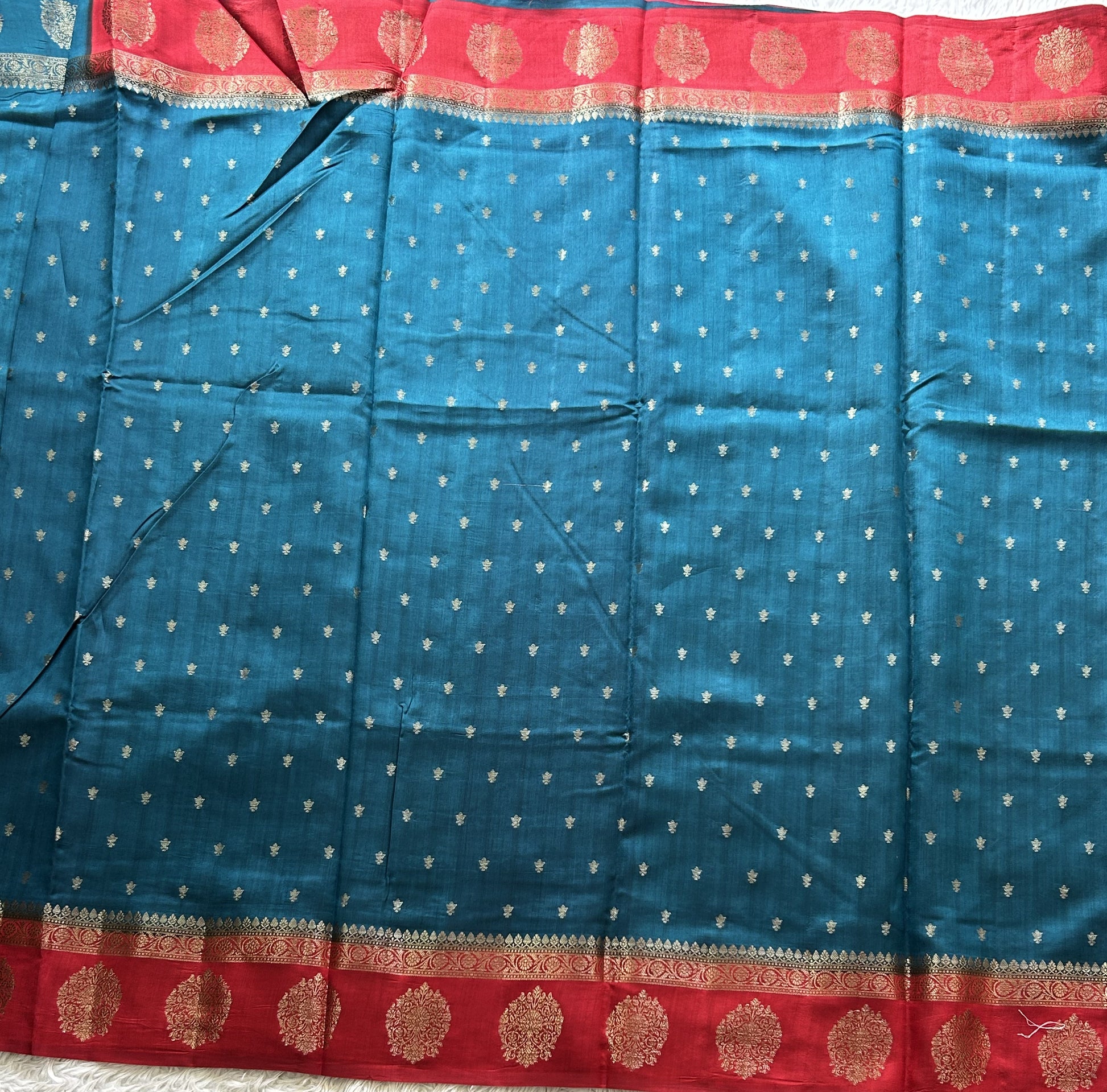 Pure Chiniya Silk Saree Dark Teel Blue Colored Elegantly Paired with a Gold Zari Border. - Sampradaya Designer Studio