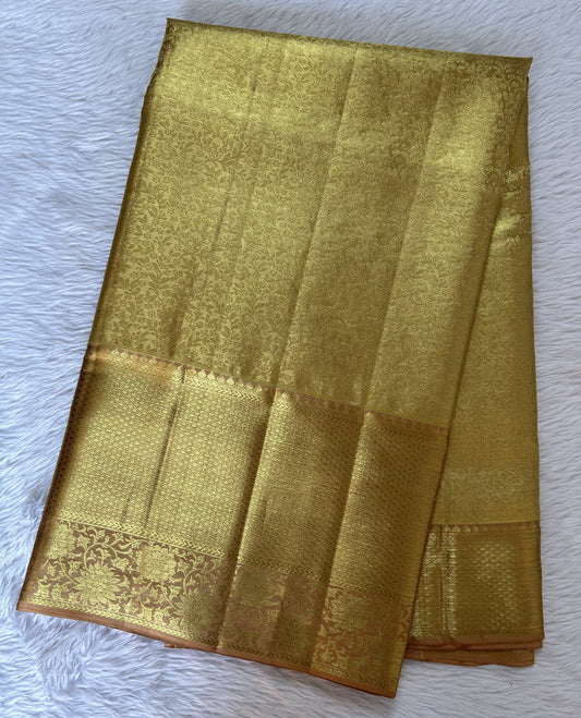 Kanjivaram Bridal Silk Saree Gold colored Saree complemented with a Light Peach Colored Kanchi border. - Sampradaya Designer Studio