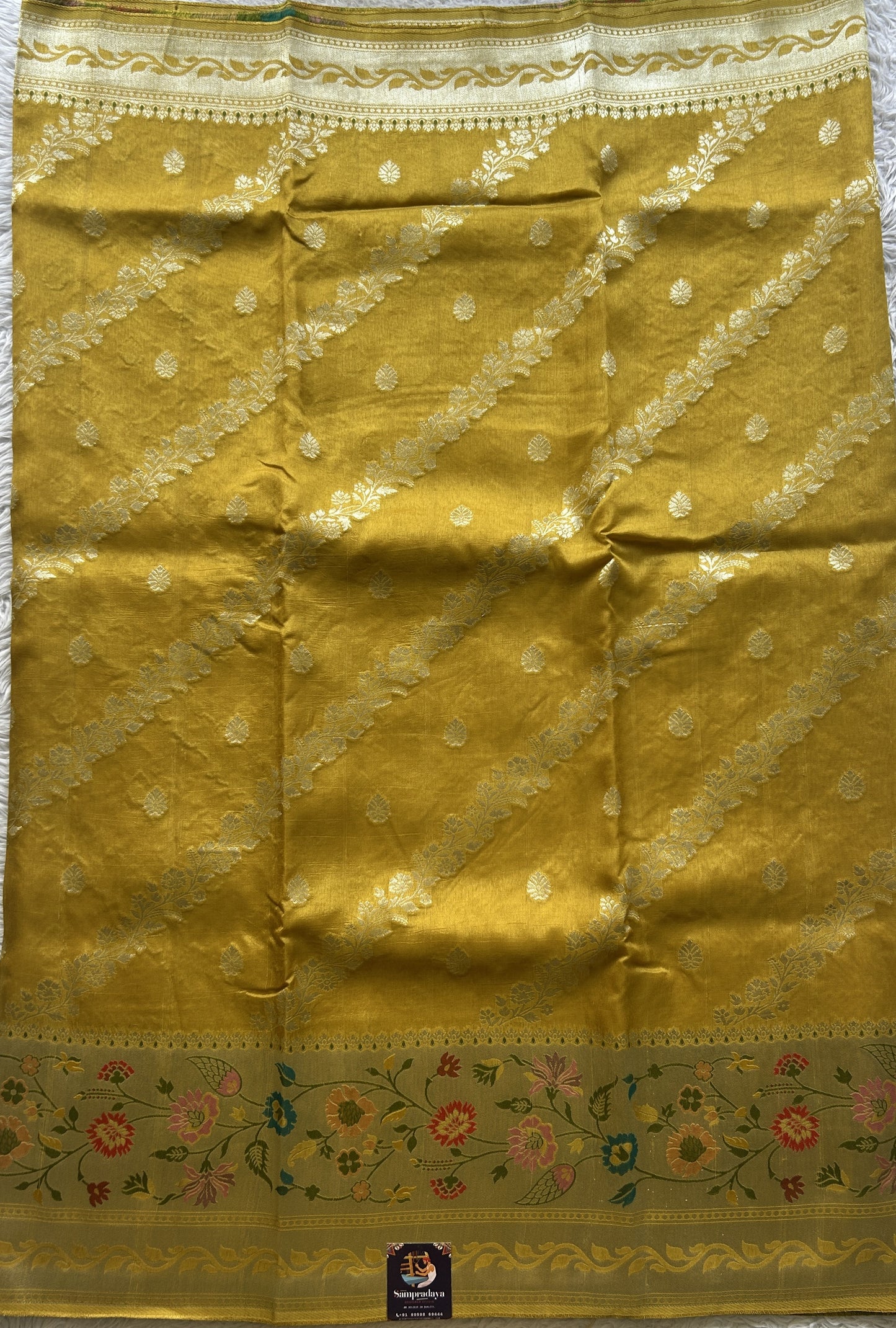 Banarasi Tussar Georgette Saree Yellow Colored Paired With a Minakari Border. - Sampradaya Designer Studio
