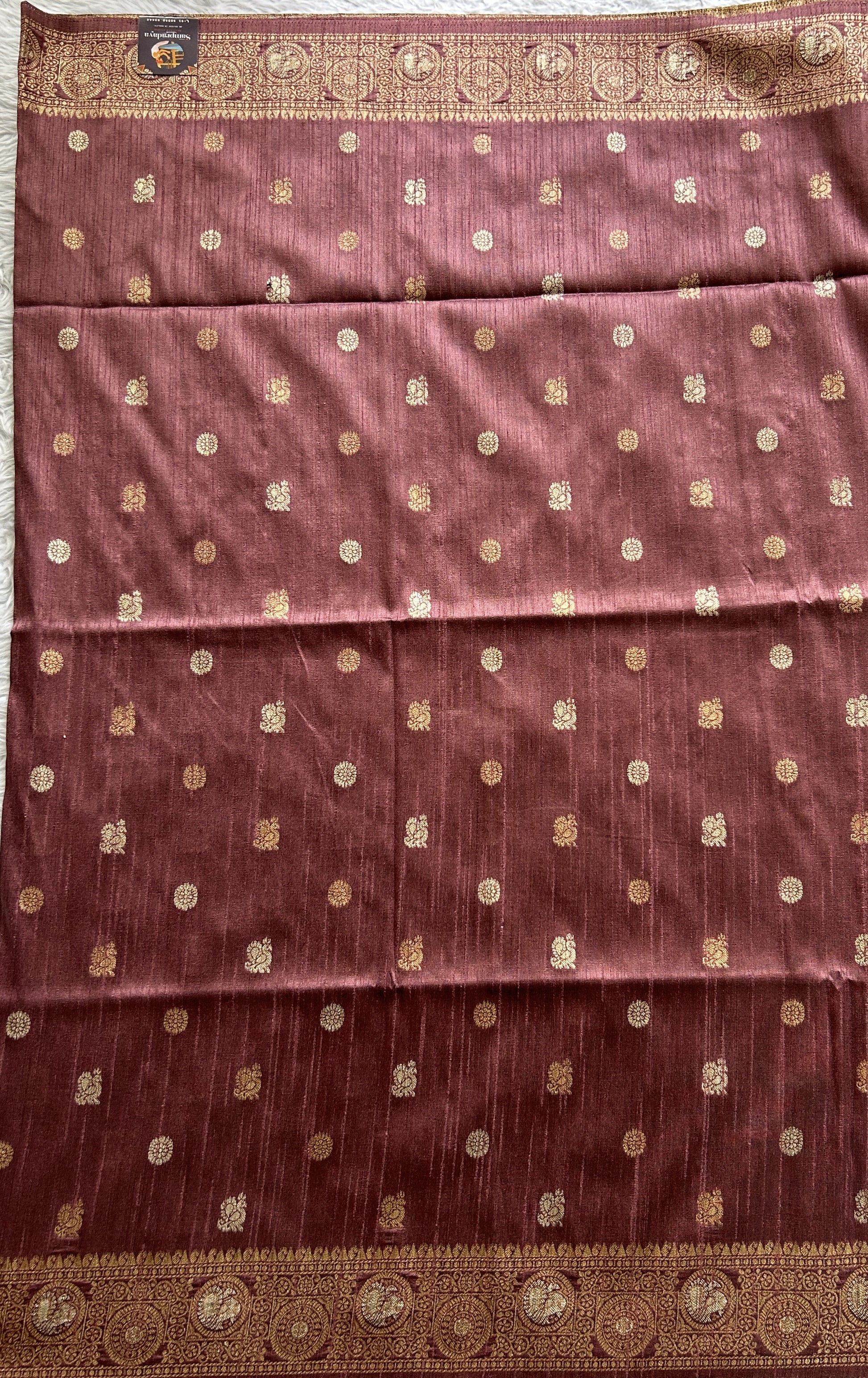 Semi Tussar Saree Mauve Colored complemented with a Zari Border. - Sampradaya Designer Studio