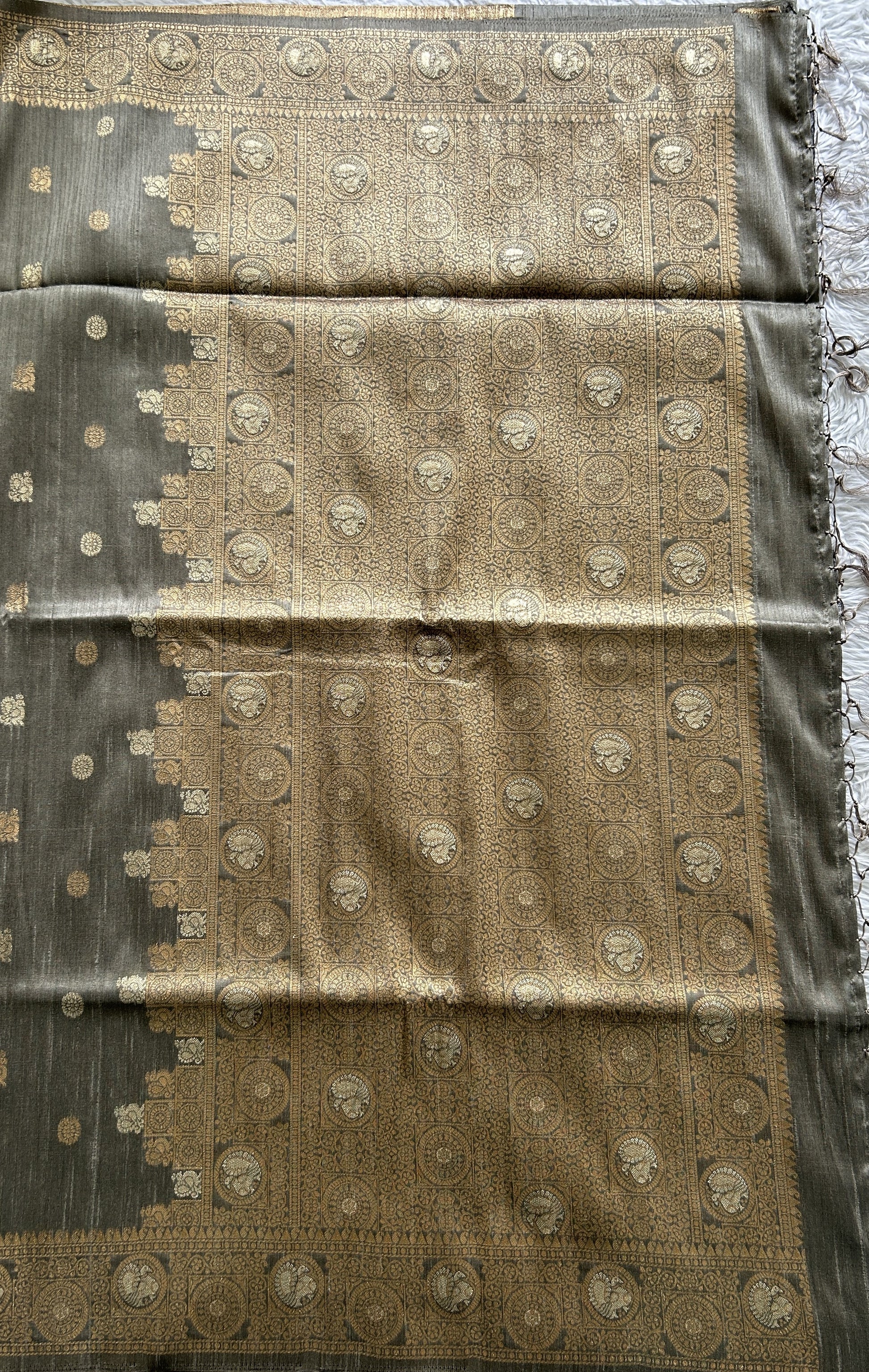 Semi Tussar Saree Gray Colored complemented with a Zari Border. - Sampradaya Designer Studio