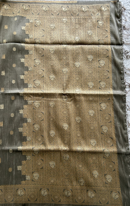 Semi Tussar Saree Gray Colored complemented with a Zari Border. - Sampradaya Designer Studio