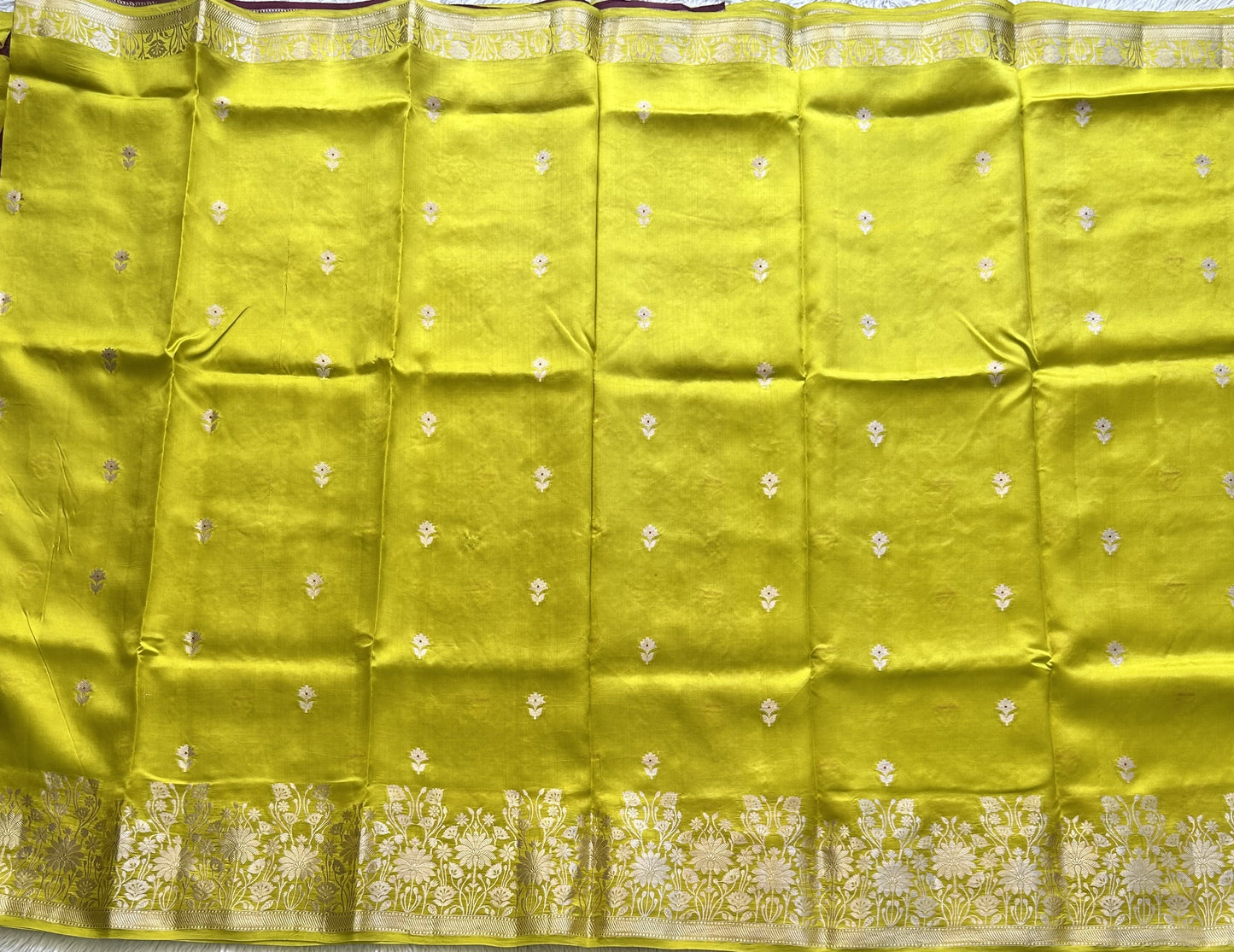Pure Chiniya Silk Saree Light Yellow Colored Elegantly Paired with a Silver Zari Border. - Sampradaya Designer Studio
