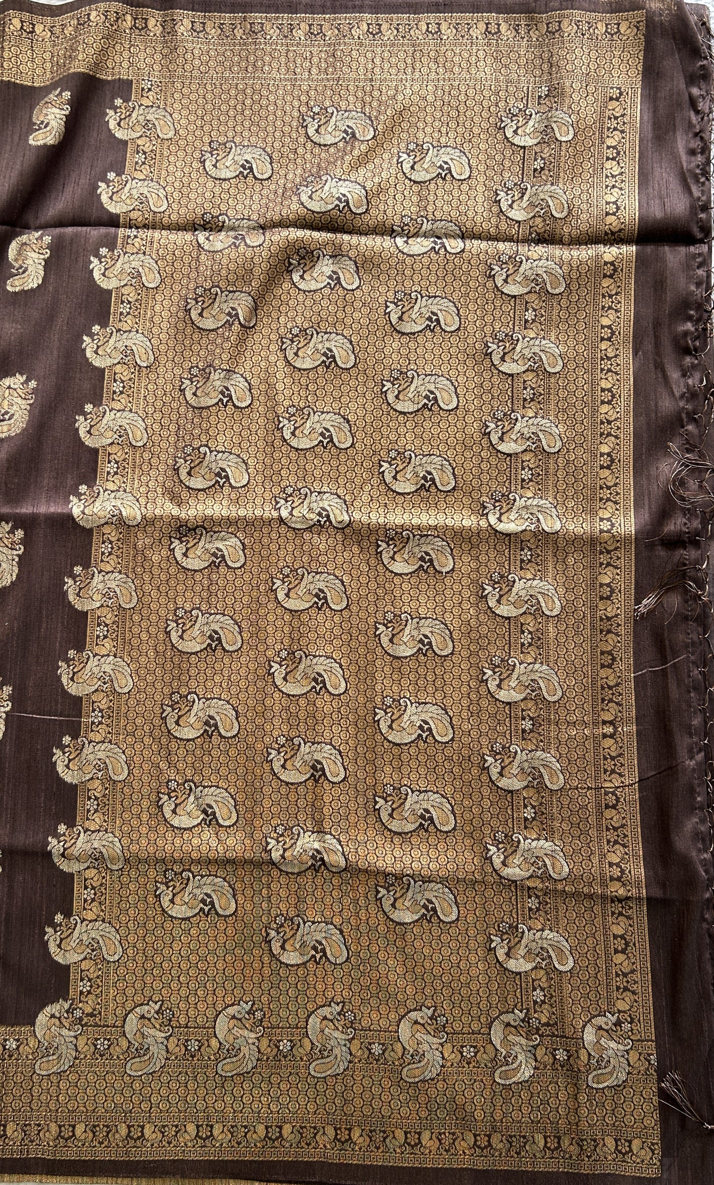 Semi Tussar Saree Snuff Colored complemented with a Zari Border. - Sampradaya Designer Studio