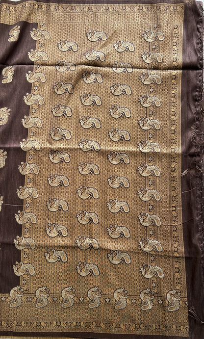 Semi Tussar Saree Snuff Colored complemented with a Zari Border. - Sampradaya Designer Studio