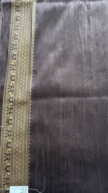 Semi Tussar Saree Snuff Colored complemented with a Zari Border. - Sampradaya Designer Studio