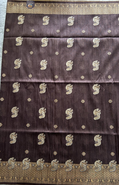 Semi Tussar Saree Snuff Colored complemented with a Zari Border. - Sampradaya Designer Studio