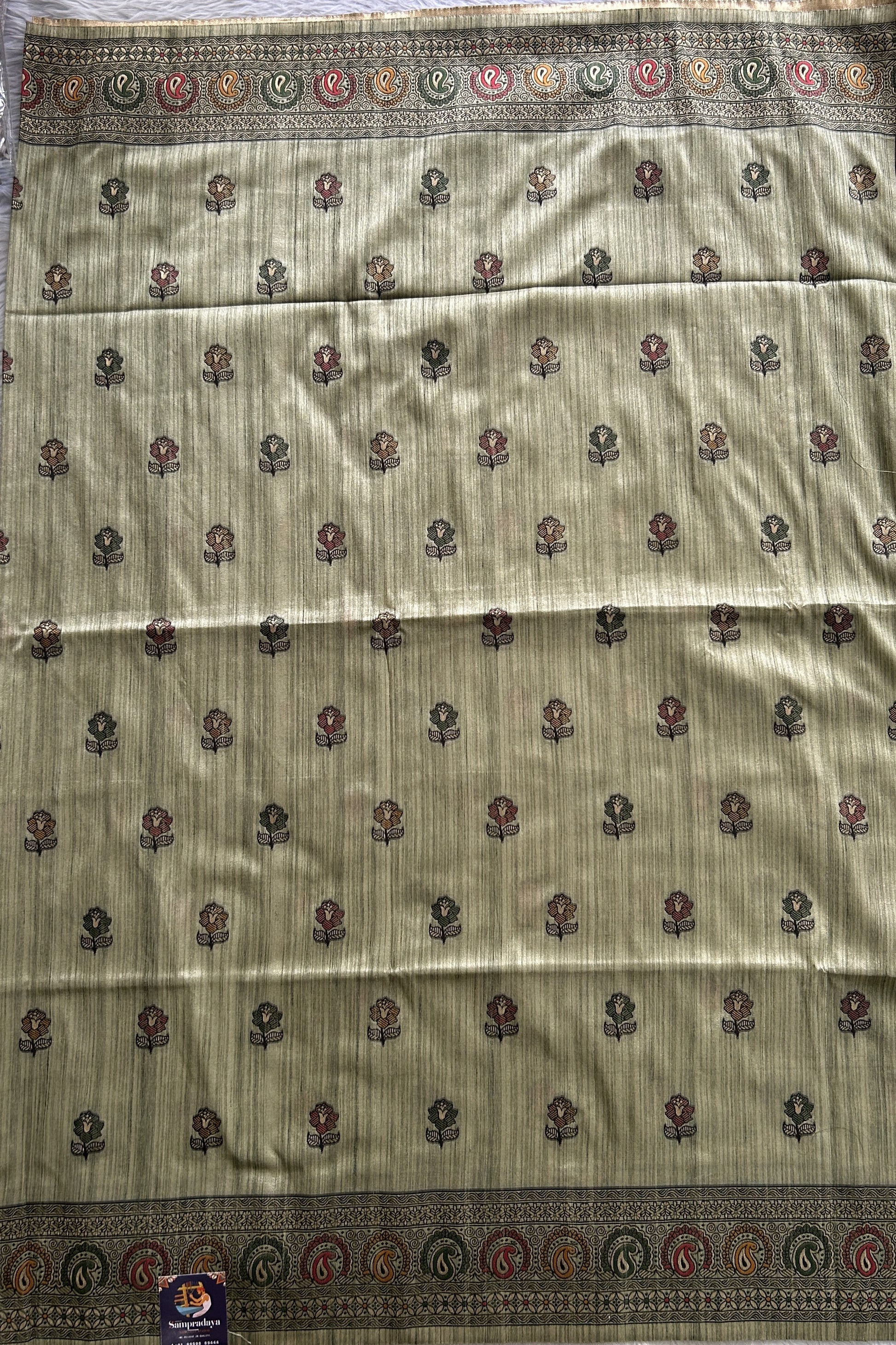 Semi Tussar Saree Green Colored complemented with a Zari Border. - Sampradaya Designer Studio