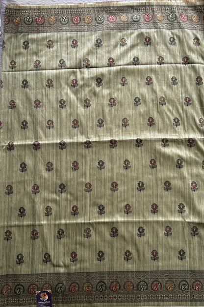 Semi Tussar Saree Green Colored complemented with a Zari Border. - Sampradaya Designer Studio