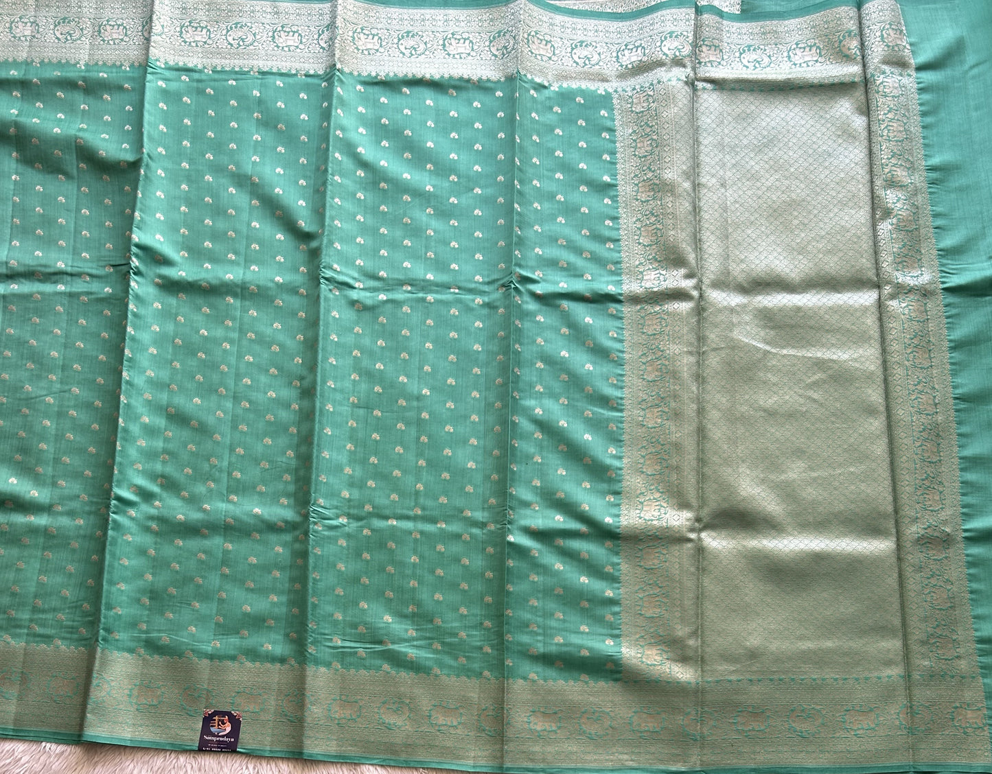 Pure Chiniya Silk Saree Jungle Colored Elegantly Paired with a Silver Zari Border. - Sampradaya Designer Studio