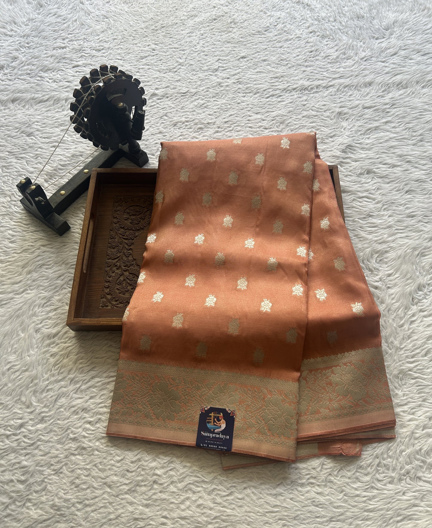 Semi Viscose Georgette Saree Light Peach Colored Paired with a Zari Border. - Sampradaya Designer Studio