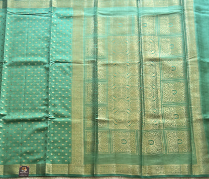 Pure Chiniya Silk Saree Dark Jungle Colored Elegantly Paired with a Gold Zari Border. - Sampradaya Designer Studio