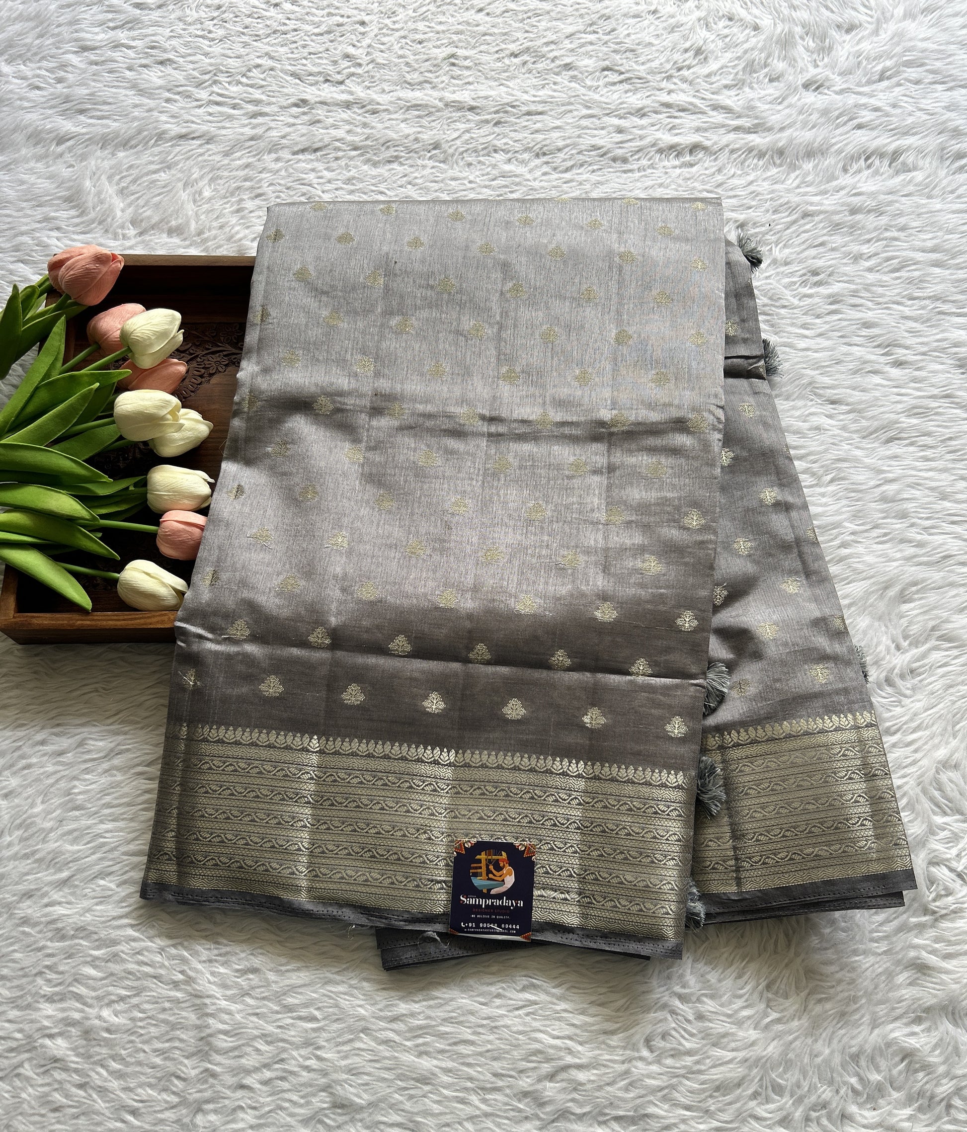 Semi Tussar Saree Gray Colored Complemented with a Zari Border. - Sampradaya Designer Studio