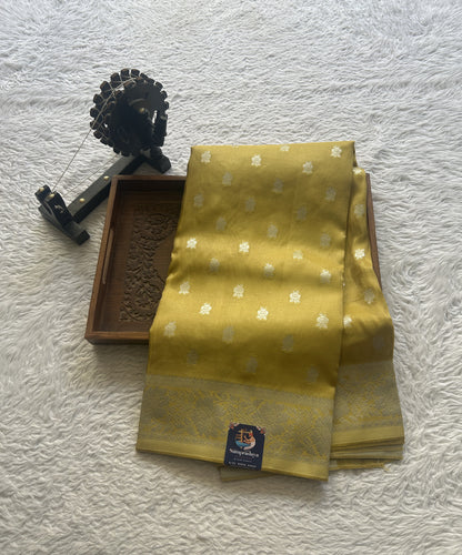 Semi Tissue Georgette Saree Yellow Colored Paired with a Zari Border. - Sampradaya Designer Studio