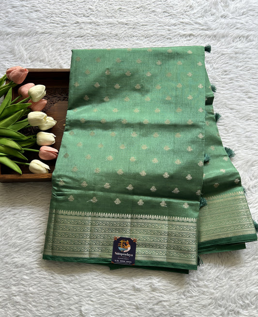 Semi Tussar Saree Dark Green Colored Complemented with a Zari Border. - Sampradaya Designer Studio