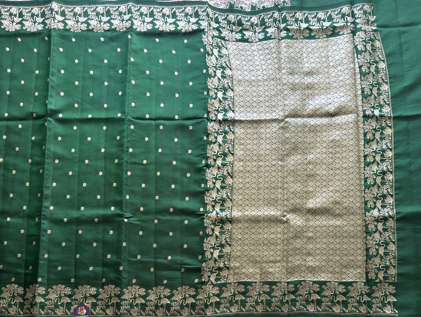 Pure Chiniya Silk Saree Dark Green Colored Elegantly Paired with a Silver Zari Border. - Sampradaya Designer Studio