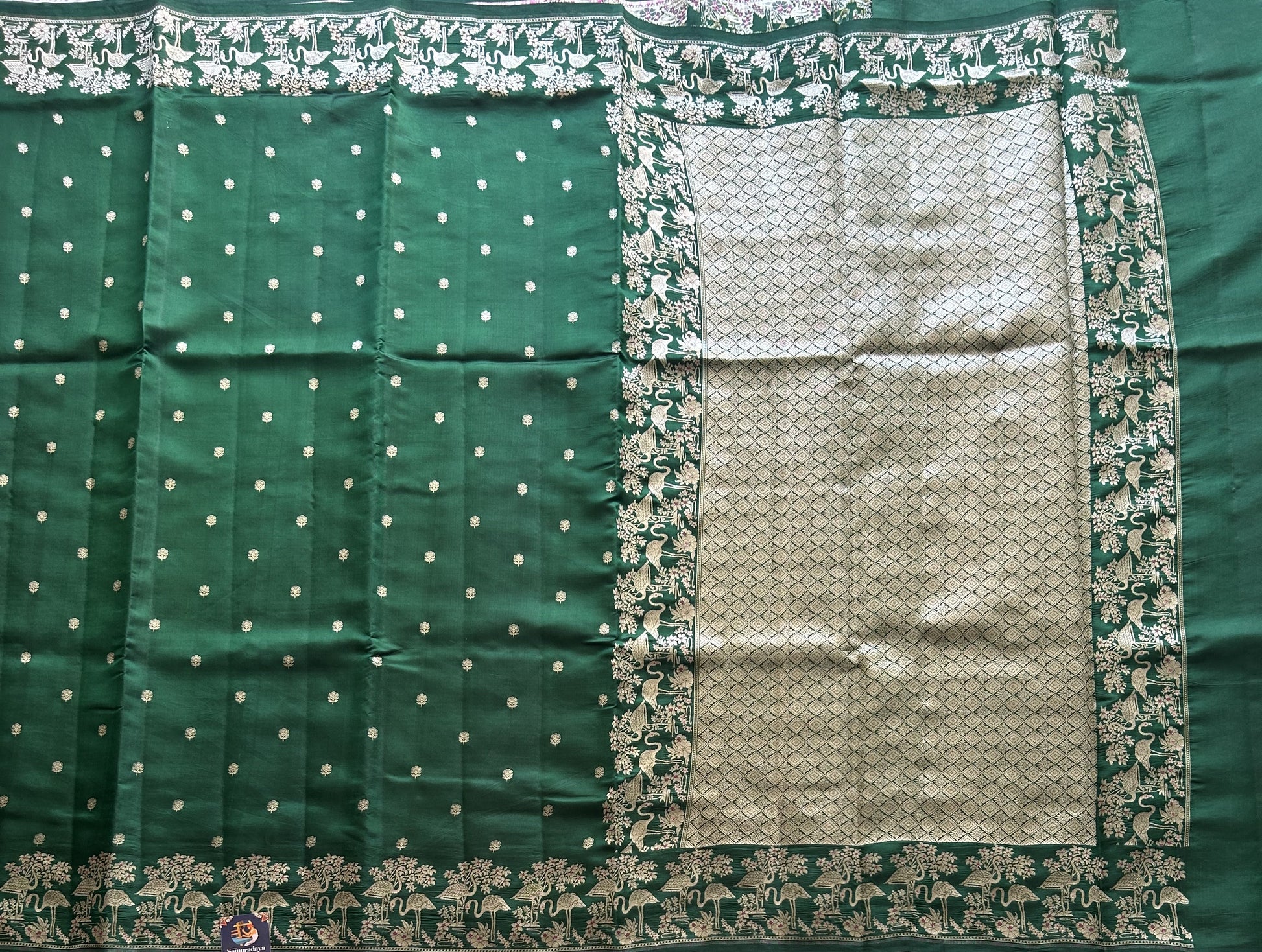 Pure Chiniya Silk Saree Dark Green Colored Elegantly Paired with a Silver Zari Border. - Sampradaya Designer Studio