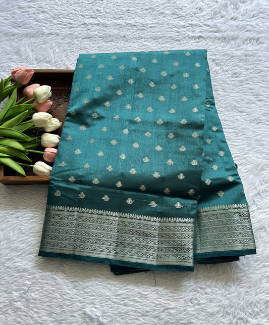Semi Tussar Saree Teal Blue Colored Complemented with a Zari Border. - Sampradaya Designer Studio