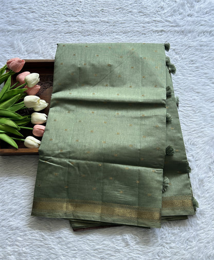 Semi Tussar Saree Light Olive Green Colored Complemented with a Zari Border. - Sampradaya Designer Studio