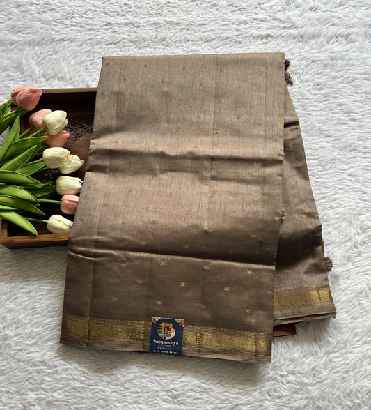 Semi Tussar Saree Snuff Colored Complemented with a Zari Border. - Sampradaya Designer Studio