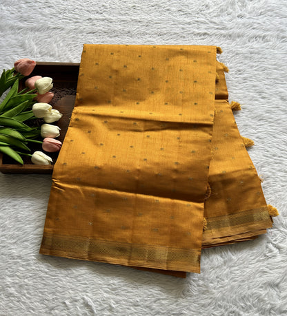 Semi Tussar Saree Turmeric Yellow Colored Complemented with a Zari Border. - Sampradaya Designer Studio