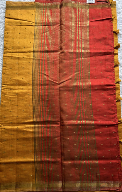 Semi Tussar Saree Turmeric Yellow Colored Complemented with a Zari Border. - Sampradaya Designer Studio
