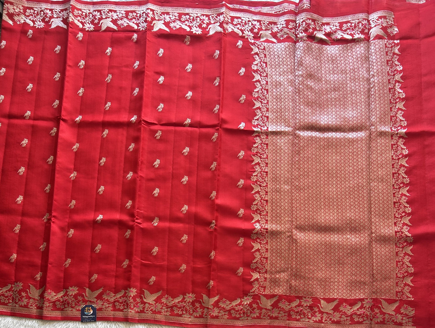 Pure Chiniya Silk Saree Red Colored Elegantly Paired with a Silver Zari Border. - Sampradaya Designer Studio