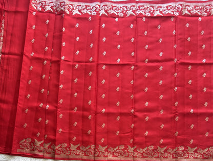 Pure Chiniya Silk Saree Red Colored Elegantly Paired with a Silver Zari Border. - Sampradaya Designer Studio