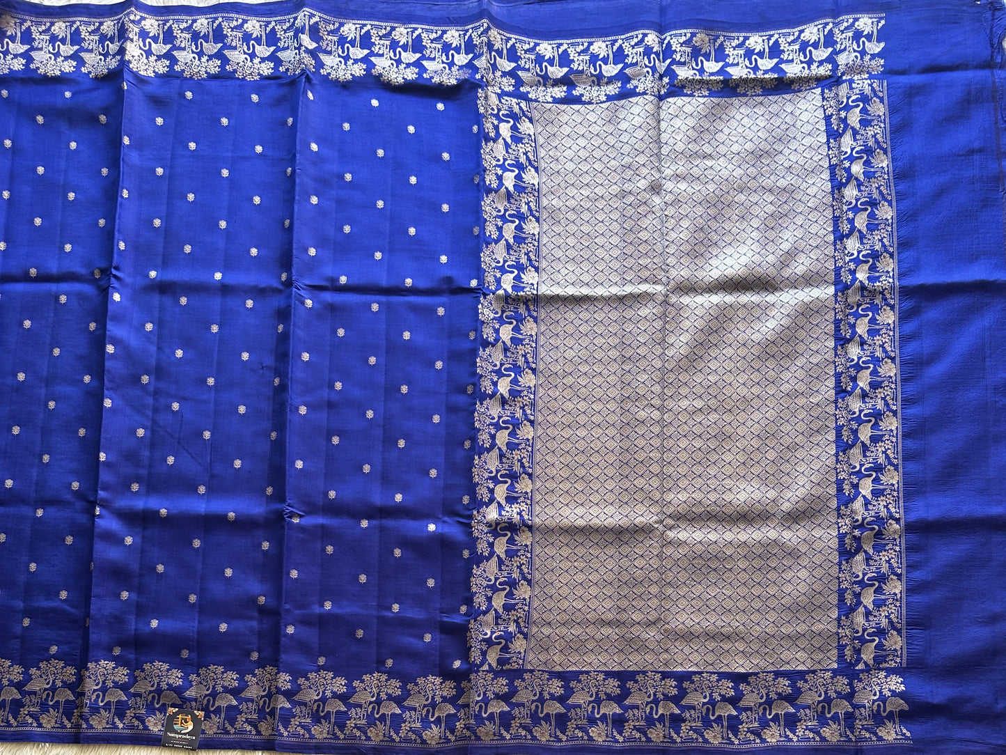 Pure Chiniya Silk Saree Vivid Blue Colored Elegantly Paired with a Silver Zari Border. - Sampradaya Designer Studio