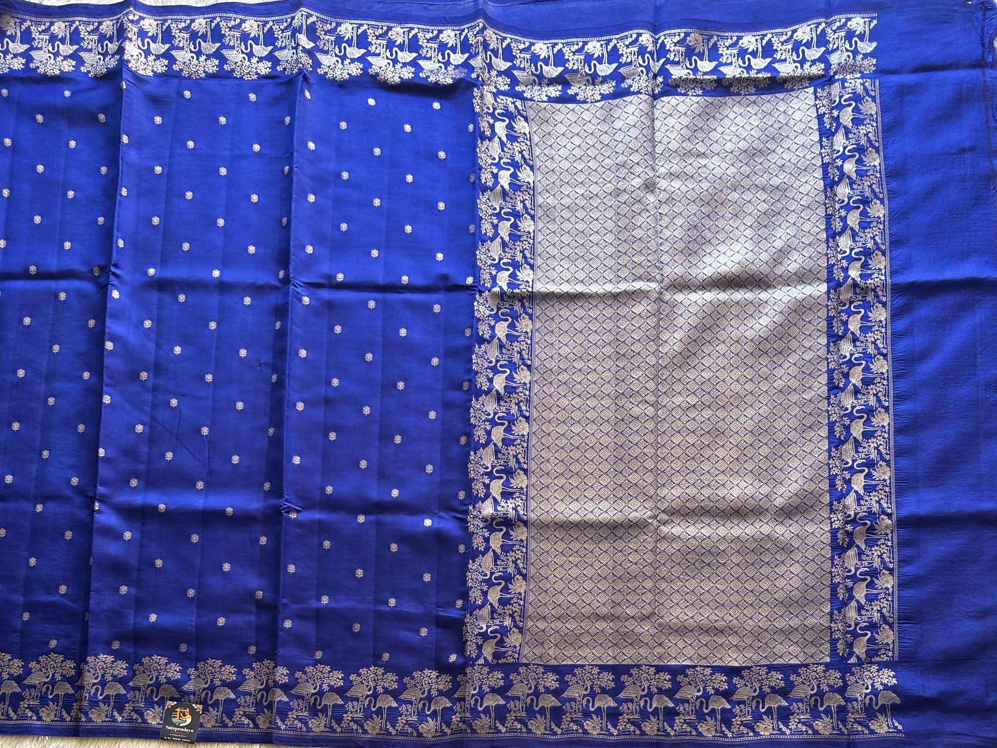 Pure Chiniya Silk Saree Vivid Blue Colored Elegantly Paired with a Silver Zari Border. - Sampradaya Designer Studio