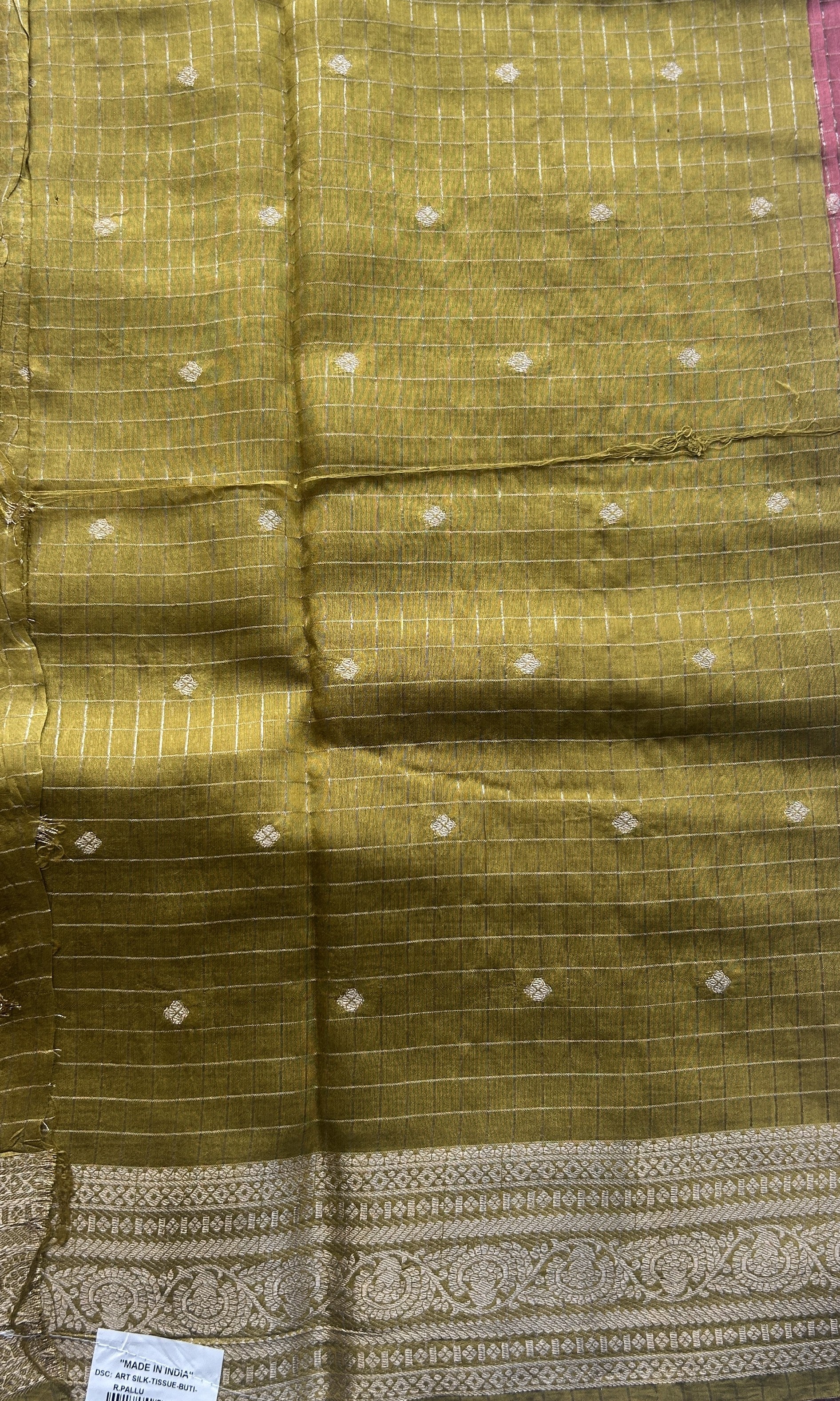 Semi Georgette Checks Saree Melon Colored Paired with a Zari Border. - Sampradaya Designer Studio