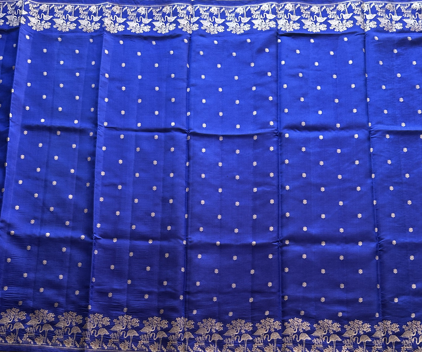 Pure Chiniya Silk Saree Vivid Blue Colored Elegantly Paired with a Silver Zari Border. - Sampradaya Designer Studio