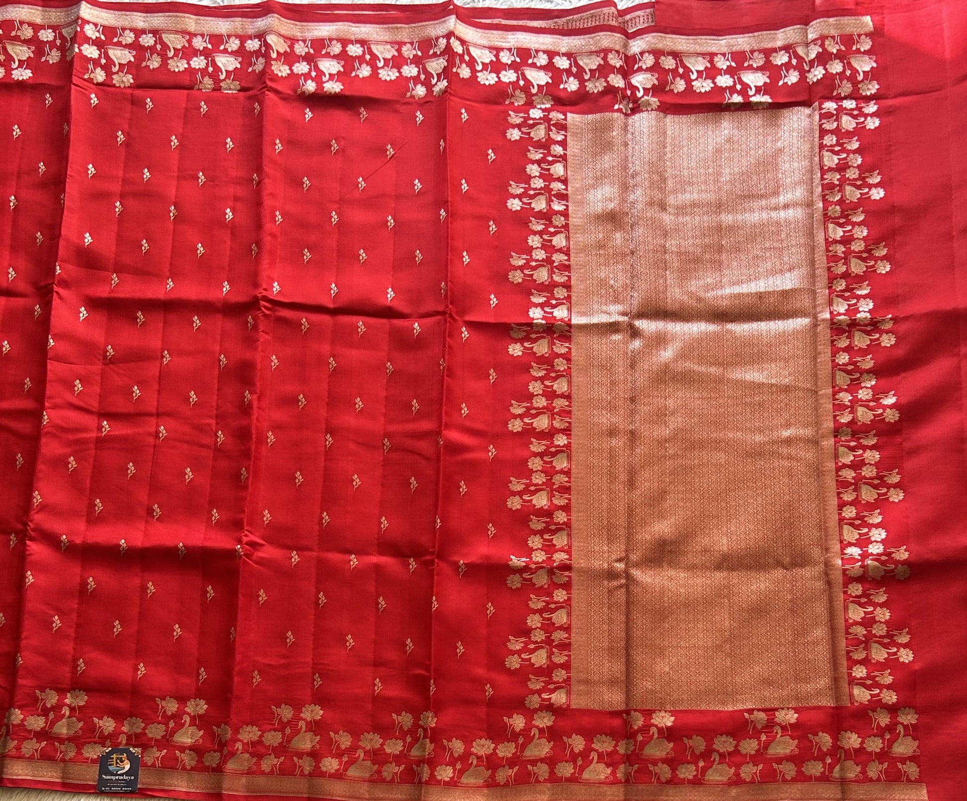 Pure Chiniya Silk Saree Tomato Red Colored Elegantly Paired with a Silver Zari Border. - Sampradaya Designer Studio