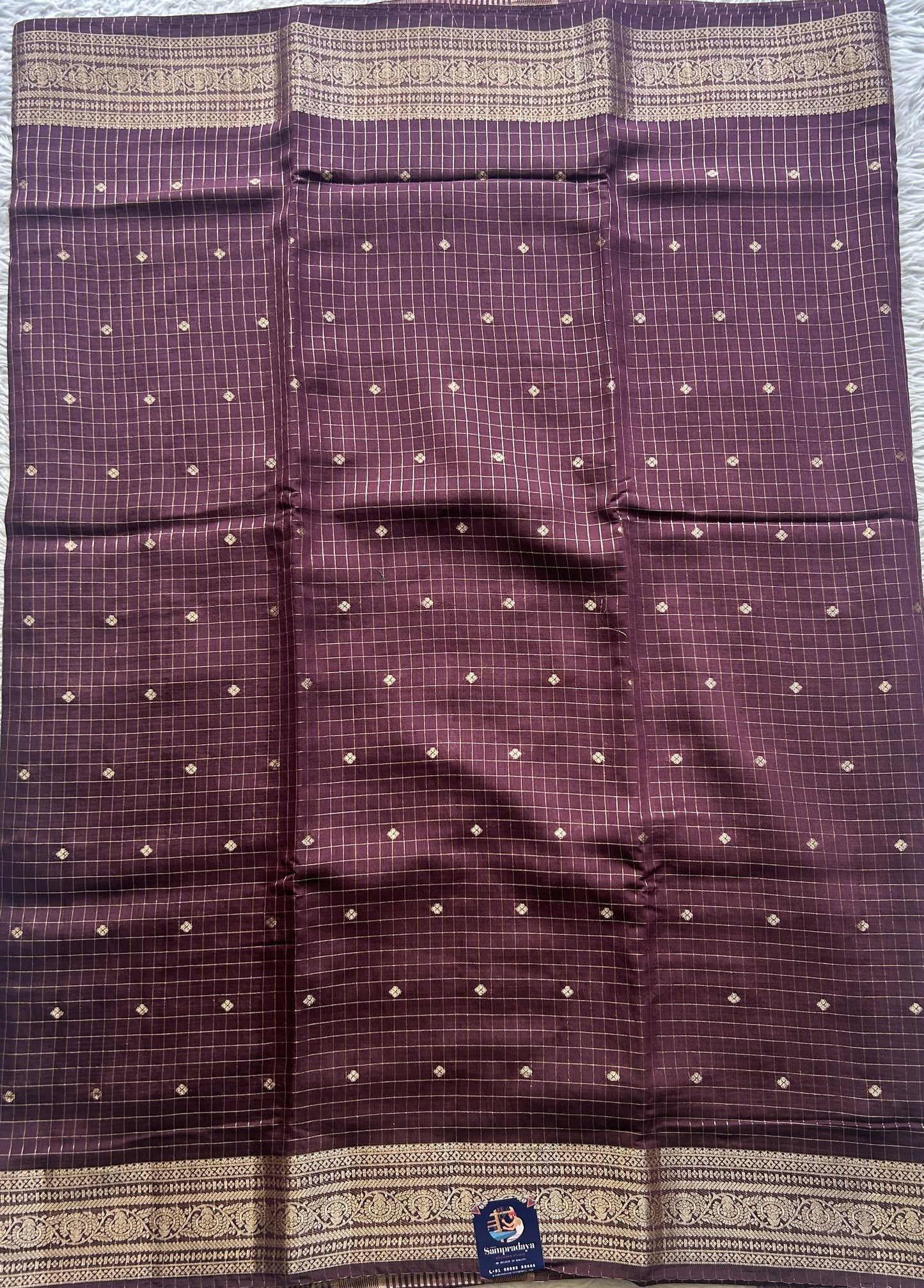 Semi Georgette Checks Saree Dark Purple Colored Paired with a Zari Border. - Sampradaya Designer Studio