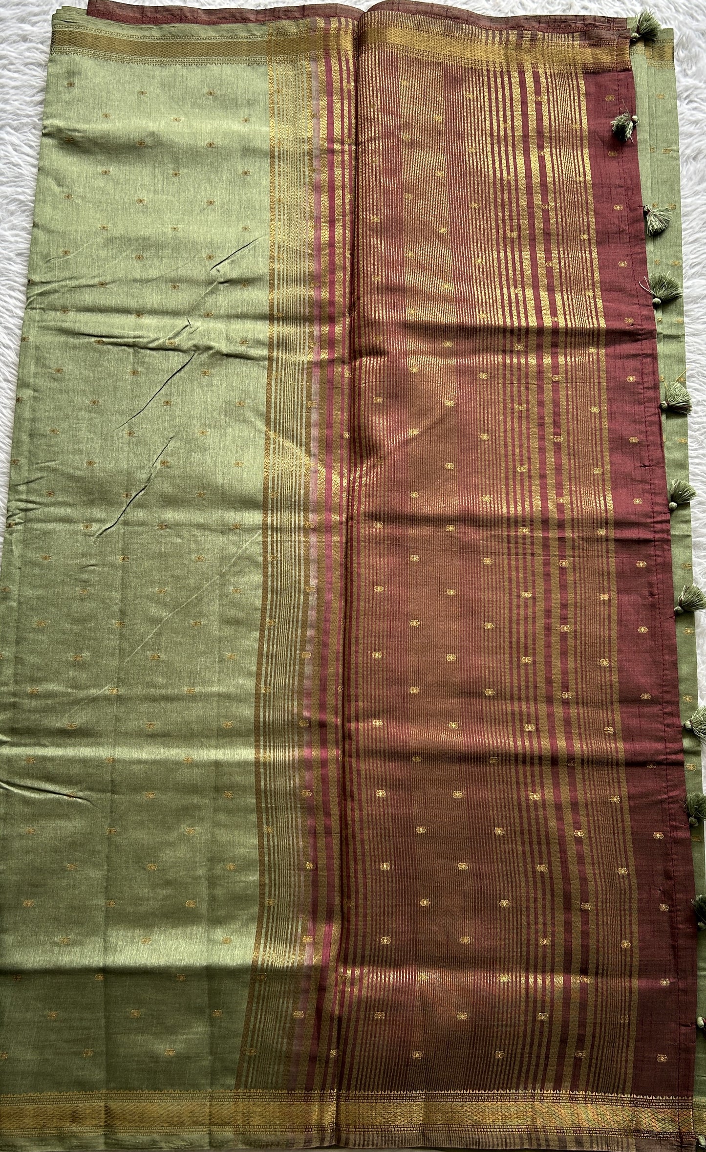 Semi Tussar Saree Light Olive Green Colored Complemented with a Zari Border. - Sampradaya Designer Studio