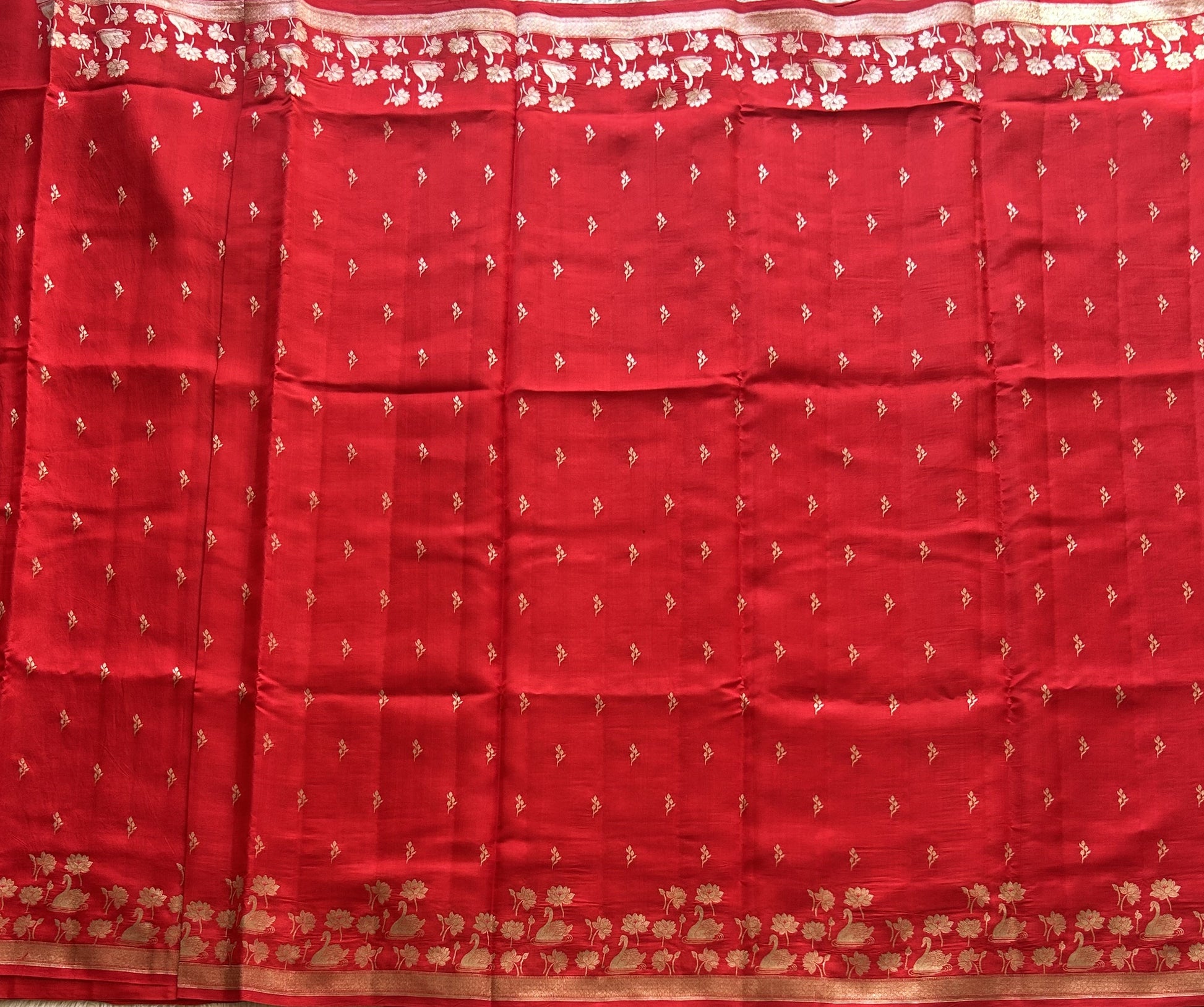 Pure Chiniya Silk Saree Tomato Red Colored Elegantly Paired with a Silver Zari Border. - Sampradaya Designer Studio