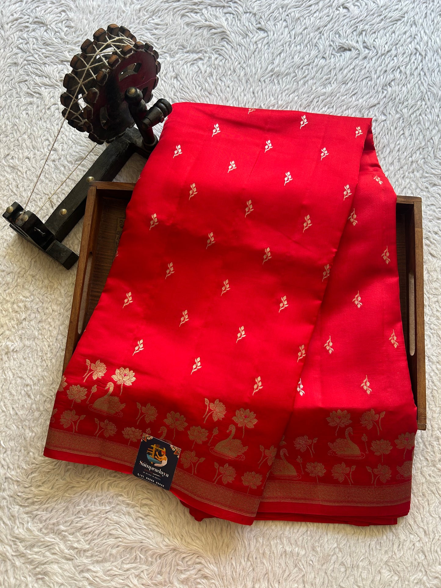 Pure Chiniya Silk Saree Tomato Red Colored Elegantly Paired with a Silver Zari Border. - Sampradaya Designer Studio