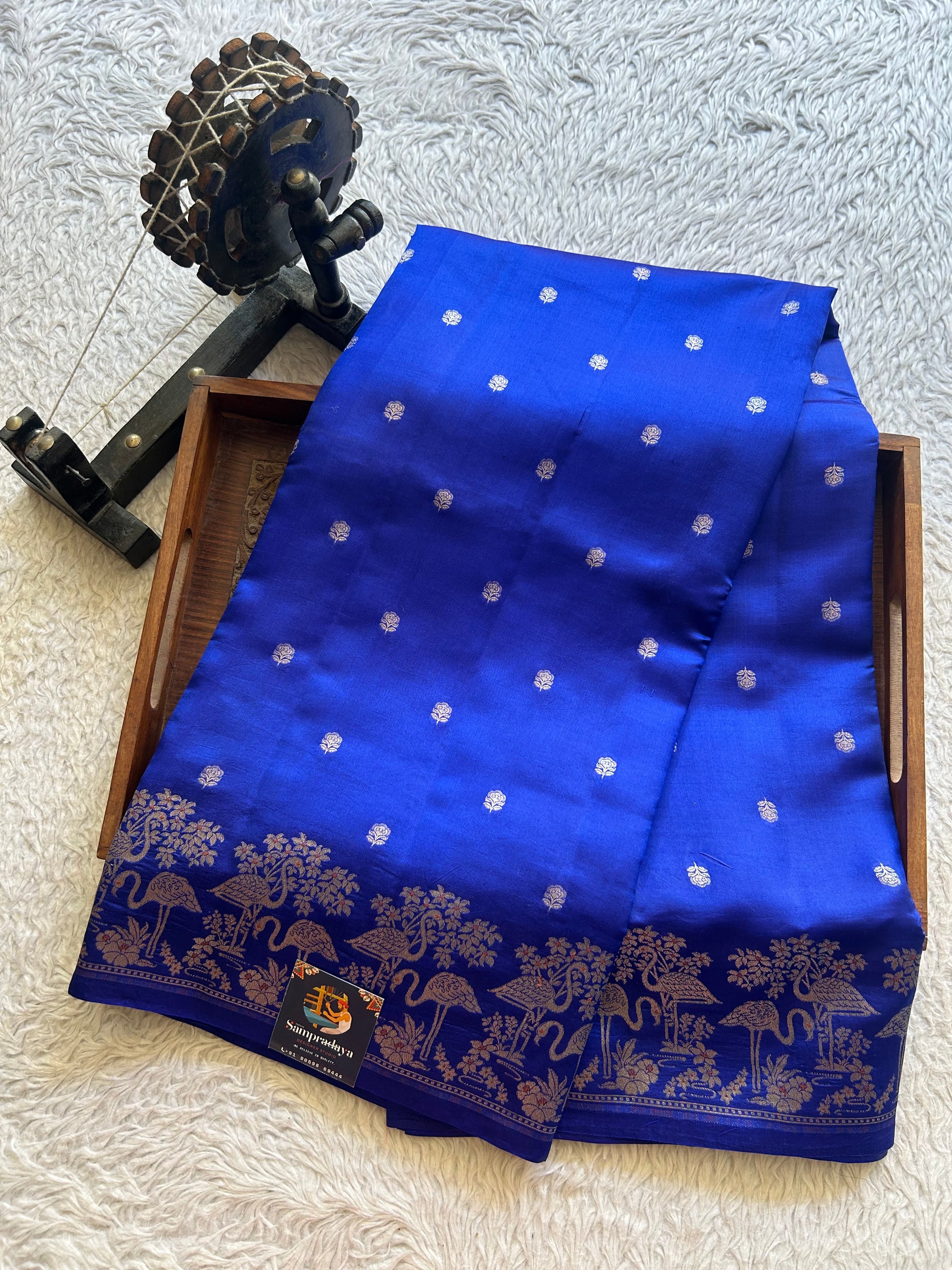 Pure Chiniya Silk Saree Vivid Blue Colored Elegantly Paired with a Silver Zari Border. - Sampradaya Designer Studio