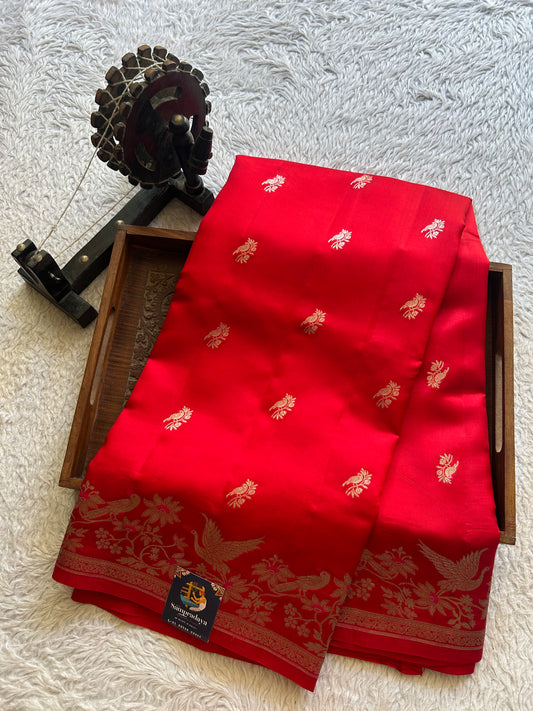 Pure Chiniya Silk Saree Red Colored Elegantly Paired with a Silver Zari Border.