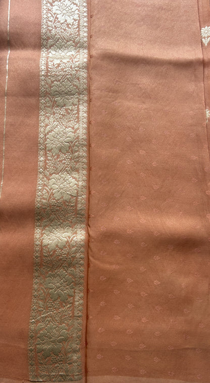 Semi Tissue Georgette Saree Peach Colored Paired with a Zari Border. - Sampradaya Designer Studio