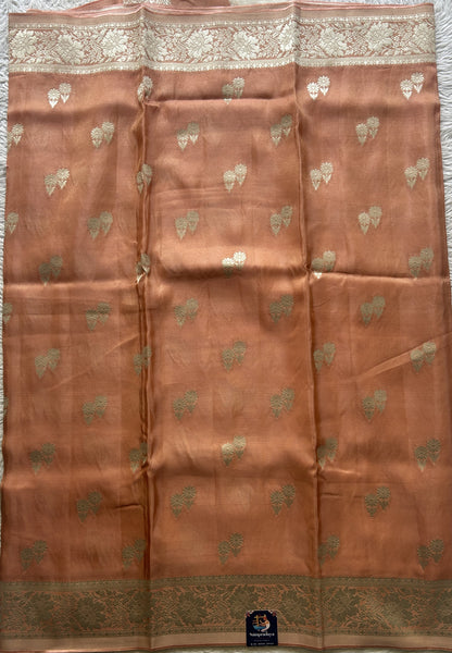 Semi Tissue Georgette Saree Peach Colored Paired with a Zari Border. - Sampradaya Designer Studio
