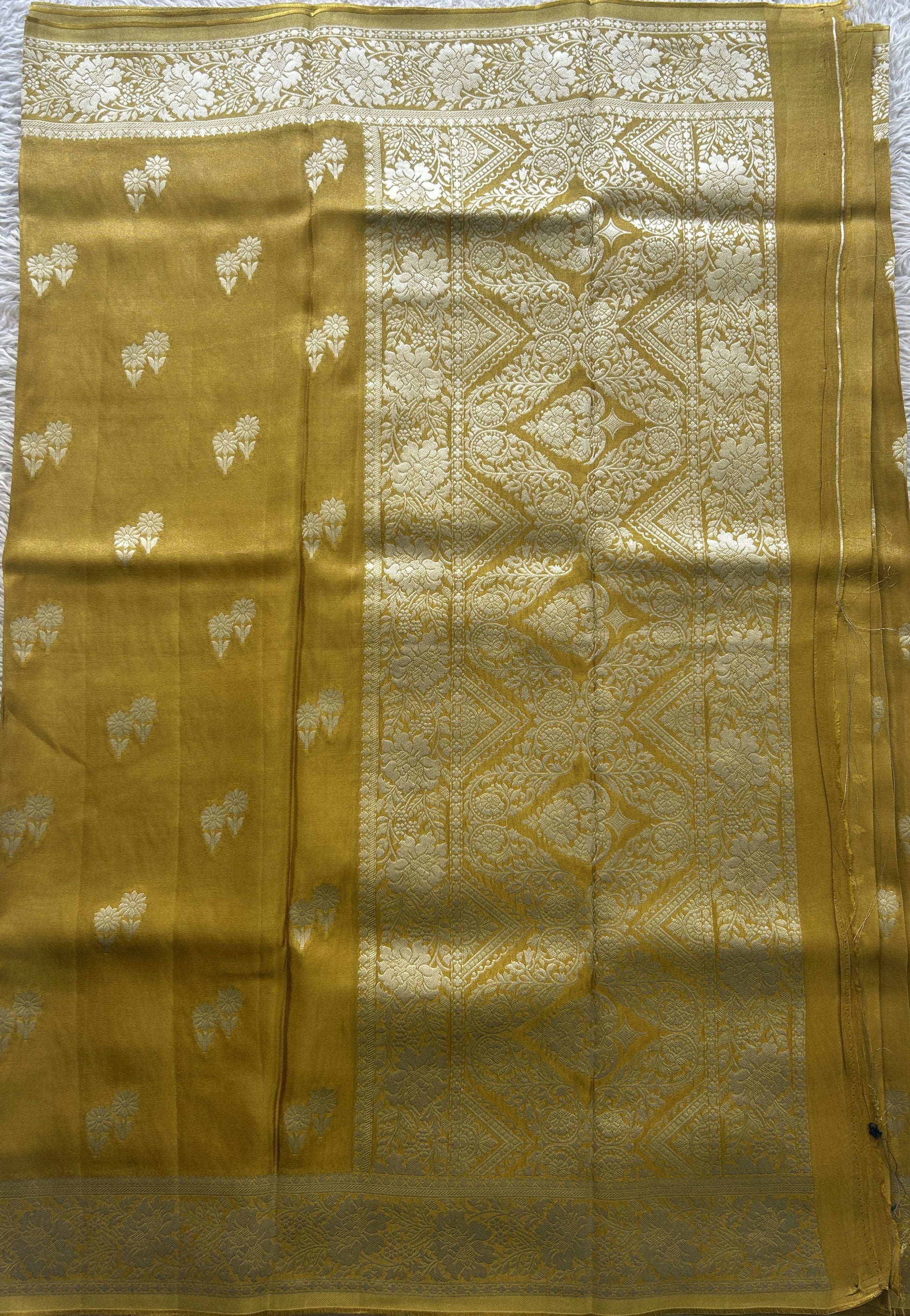 Semi Viscose Georgette Saree Mustard Colored Paired with a Zari Border. - Sampradaya Designer Studio
