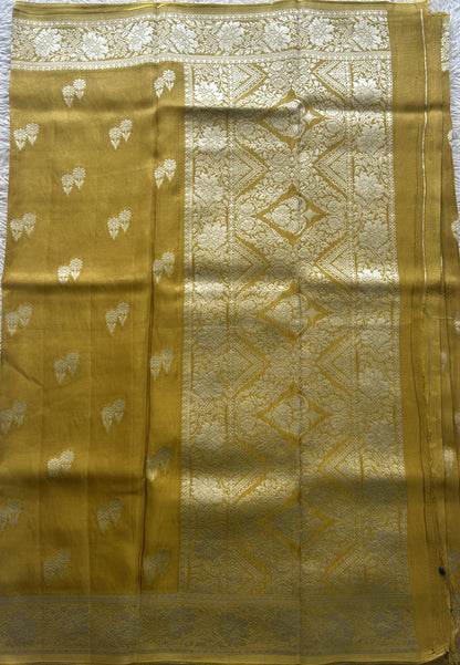 Semi Viscose Georgette Saree Mustard Colored Paired with a Zari Border. - Sampradaya Designer Studio