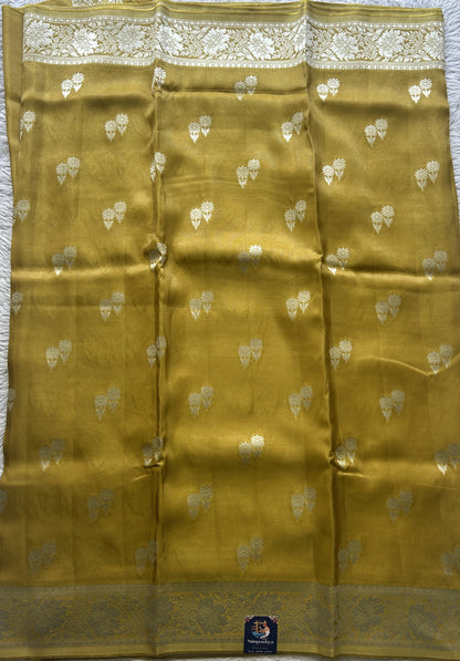 Semi Viscose Georgette Saree Mustard Colored Paired with a Zari Border. - Sampradaya Designer Studio