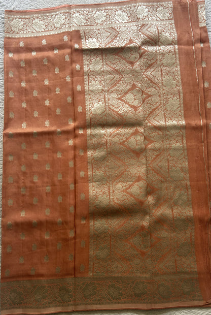 Semi Viscose Georgette Saree Light Peach Colored Paired with a Zari Border. - Sampradaya Designer Studio