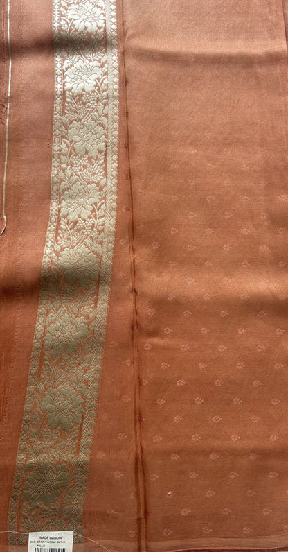 Semi Viscose Georgette Saree Light Peach Colored Paired with a Zari Border. - Sampradaya Designer Studio