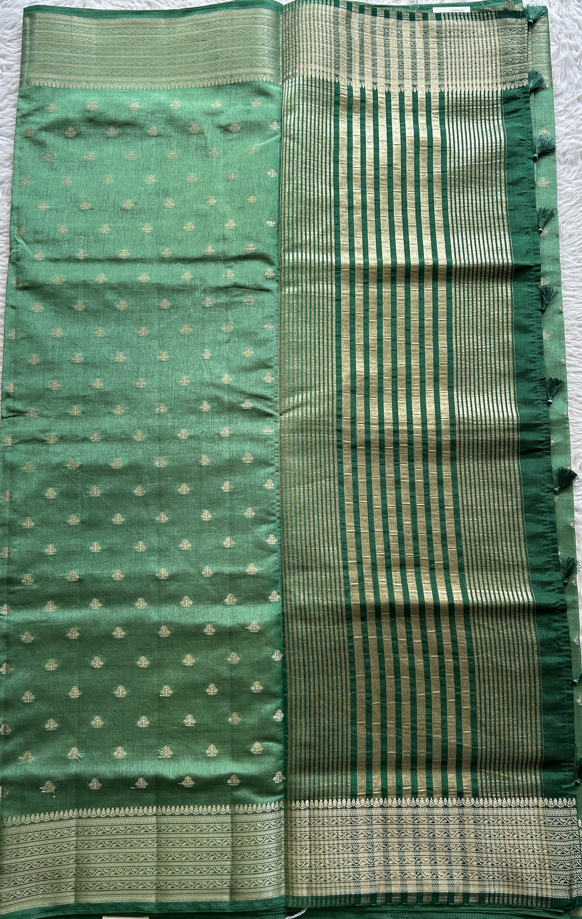 Semi Tussar Saree Dark Green Colored Complemented with a Zari Border. - Sampradaya Designer Studio