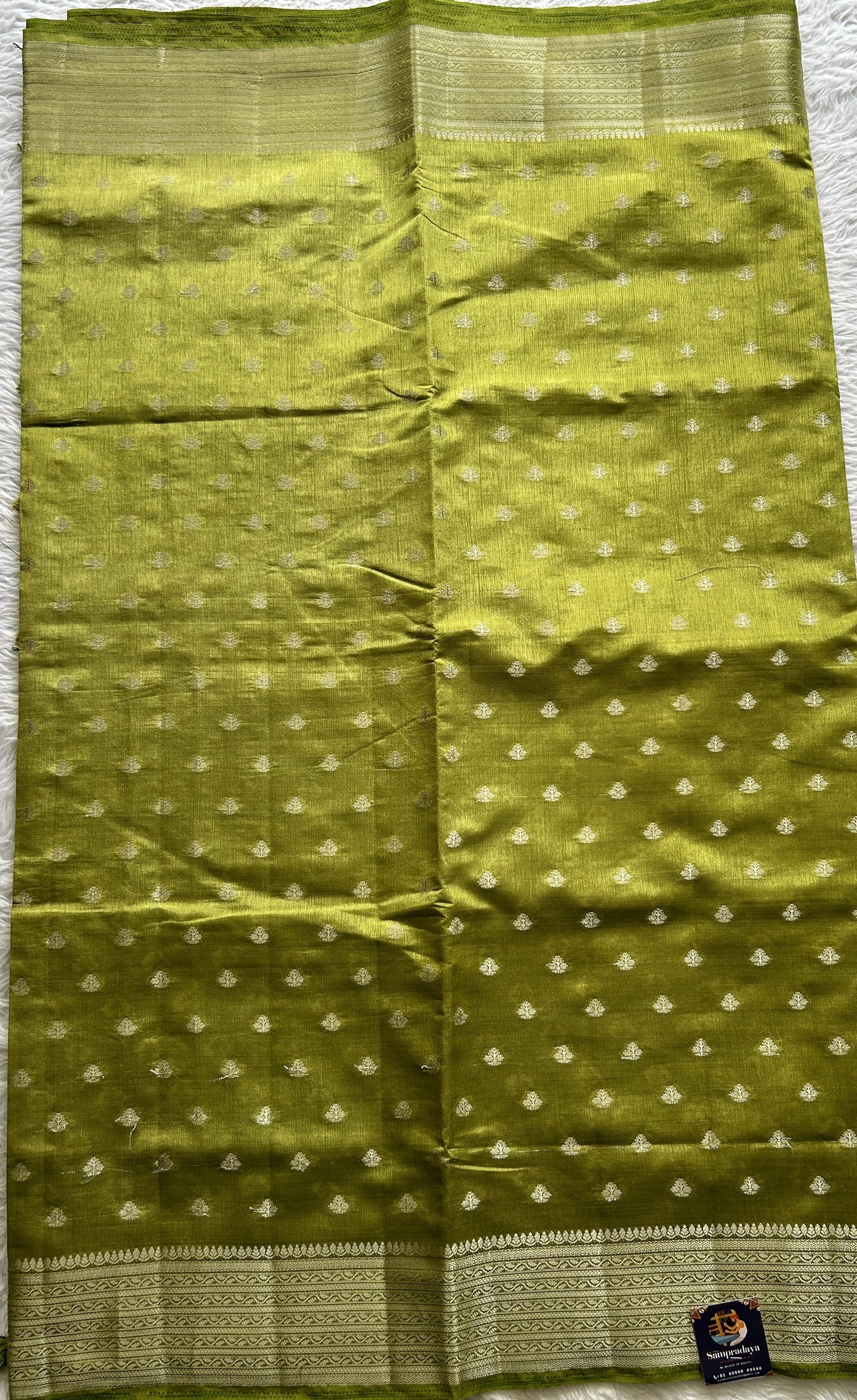 Semi Tussar Saree Green Colored Complemented with a Zari Border. - Sampradaya Designer Studio