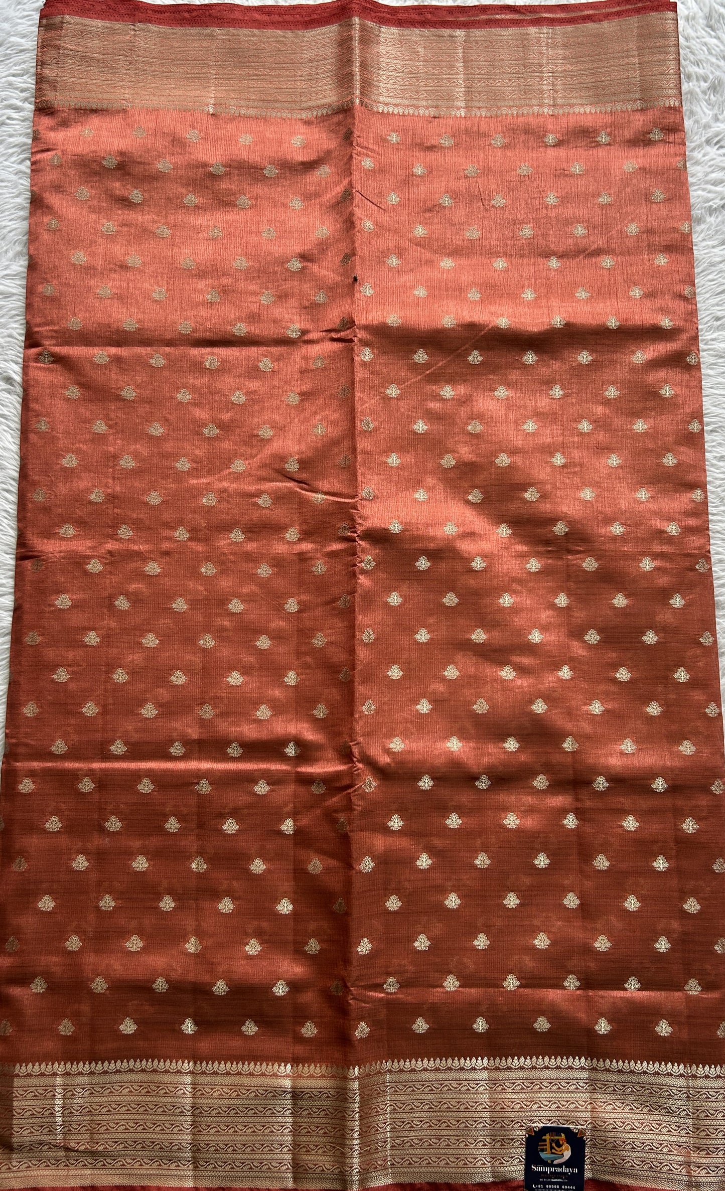Semi Tussar Saree Peach Colored Complemented with a Zari Border. - Sampradaya Designer Studio